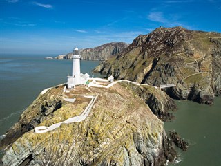 Visit attractions like the South Stack Lighthouse in Anglesey